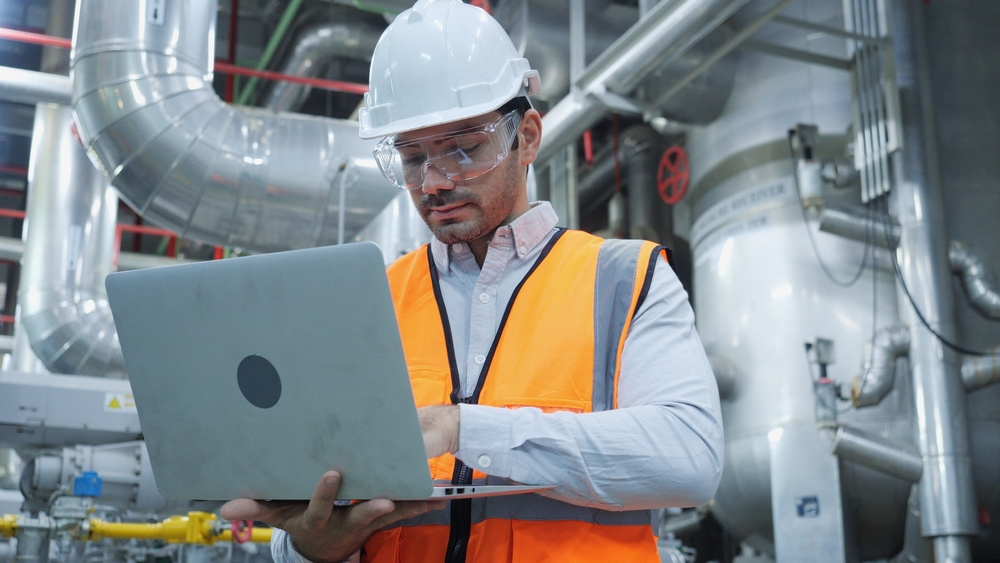 Operations manager reviewing scenario planning results on a dashboard
